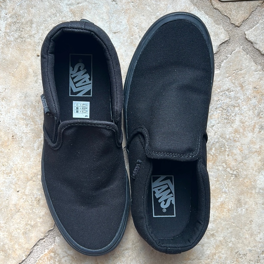 Almost BRAND NEW. Black VANS slip on.